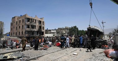 A crane lifts a carriage at the site after an explosion that targeted a train in Quetta, Pakistan, May 24, 2026. (AFP Photo)