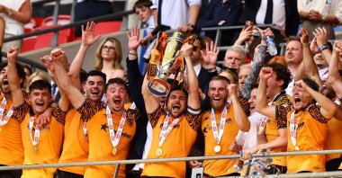 Hull City players celebrate with the trophy after winning the Championship Playoff Final, London, U.K., May 23, 2026. (Reuters Photo)