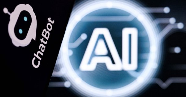 A photo shows the letters AI for Artificial Intelligence on a laptop screen (R) next to the logo of the AI Chatbot application on a smartphone screen in Frankfurt, Germany, May 13, 2026. (AFP Photo)