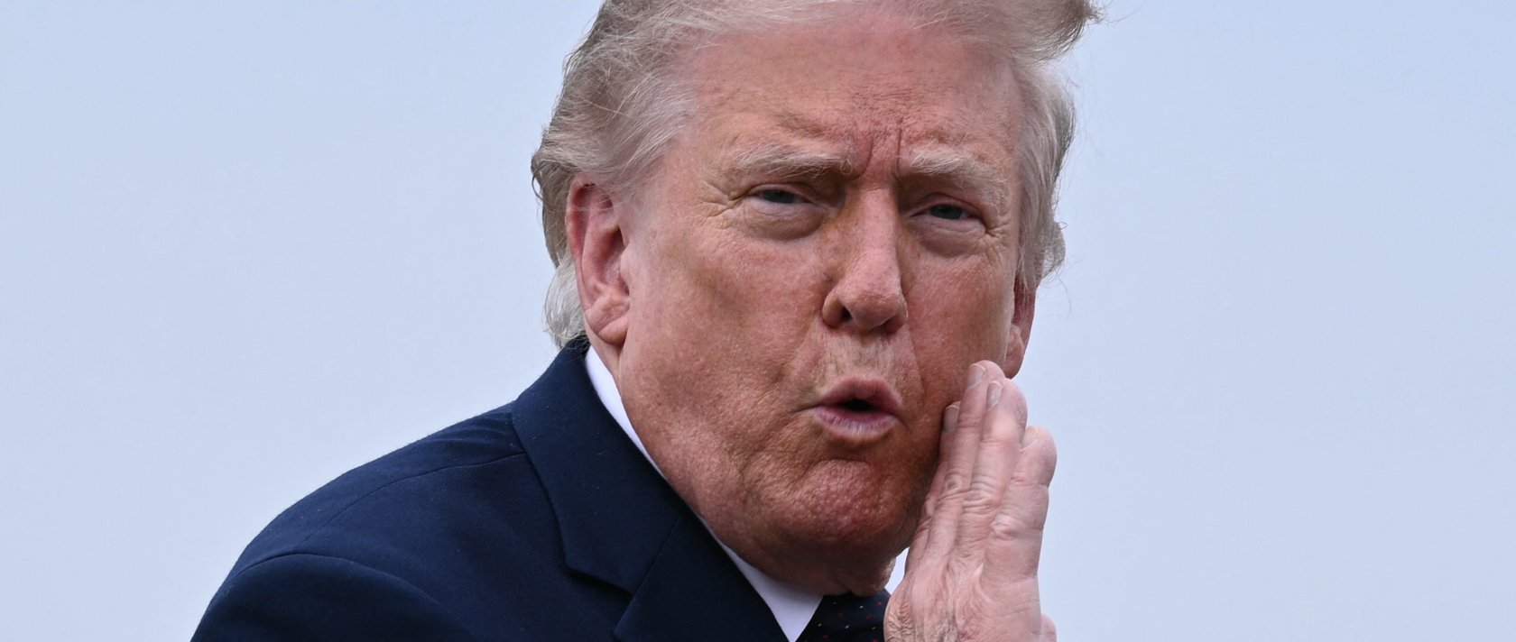 U.S. President Donald Trump gestures as he walks to board a plane at Morristown Airport in Morristown, New Jersey, U.S., May 22, 2026. (AFP Photo)