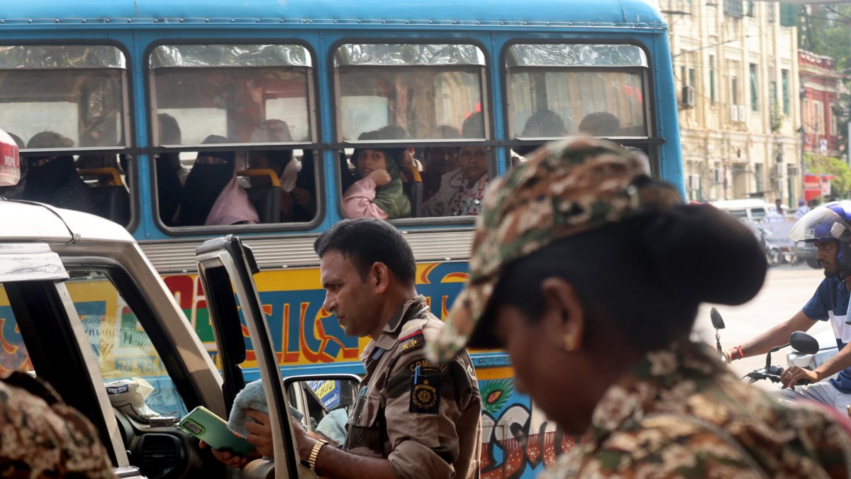 Police officers patrol after a clash between demonstrators and police at Park Circus in Kolkata, India, May 19, 2026. (EPA Photo)