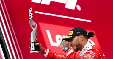 Second-placed Lewis Hamilton of Great Britain and Scuderia Ferrari on the podium with his trophy during the F1 Grand Prix of Canada at Circuit Gilles-Villeneuve, Montreal, Canada, May 24, 2026. (AA Photo)