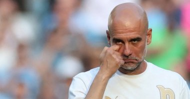 Manchester City manager Pep Guardiola reacts during a presentation after his last Premier League game for the club at Etihad Stadium, Manchester, U.K., May 24, 2026. (Reuters Photo)