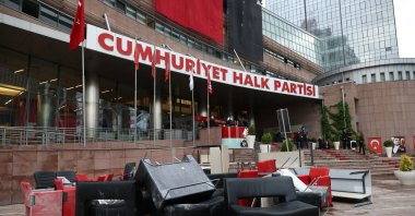 Furniture sits outside the entrance of the headquarters of the main opposition Republican People’s Party (CHP) after riot police entered to evict its ousted leadership, following enforcement of a court ruling, in Ankara, Türkiye, May 24, 2026. (Reuters Photo)