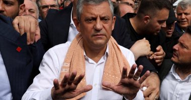 Özgür Özel, ousted chair of the main opposition Republican People’s Party (CHP), reacts as he leaves the party’s headquarters in Ankara, Türkiye, May 24, 2026. (Reuters Photo)