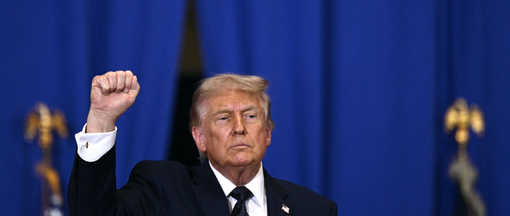 US President Donald Trump raises a fist as he departs after delivering a speech about the economy at Rockland Community College Fieldhouse in Suffern, New York, U.S., May 22, 2026. (AFP Photo)