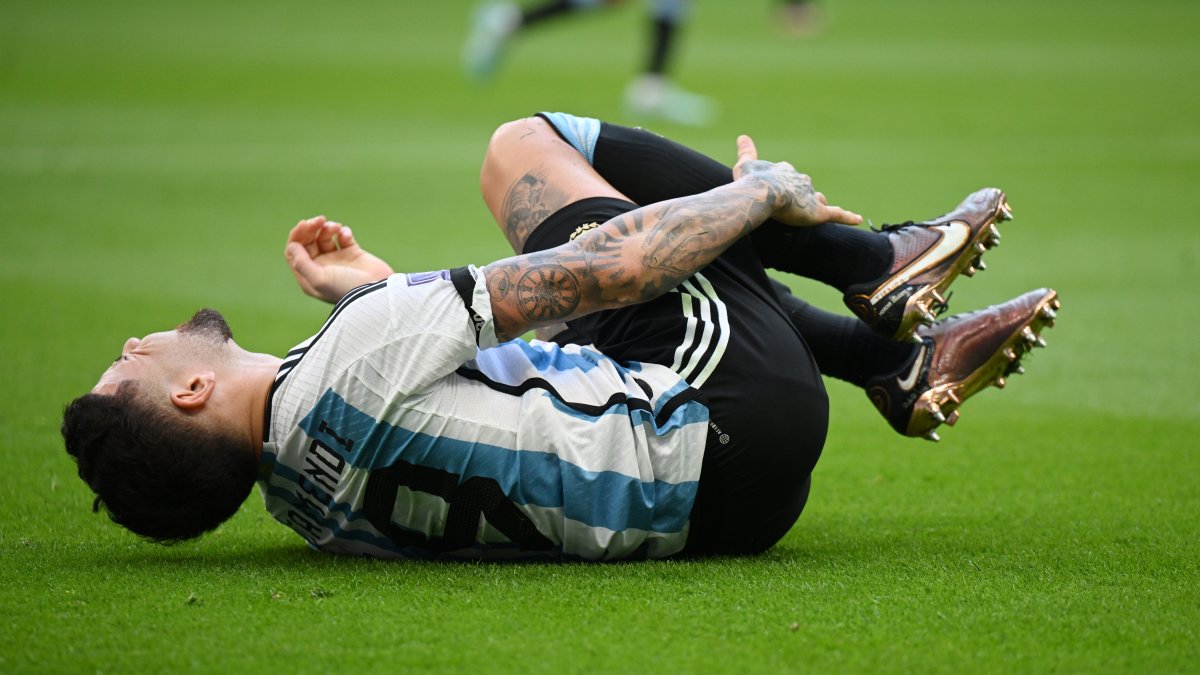 Argentina's Lionel Messi lies injured during the FIFA World Cup Qatar 2022 Group C match against Saudi Arabia at Lusail Stadium, Lusail City, Qatar, Nov. 22, 2022. (Getty Images Photo)
