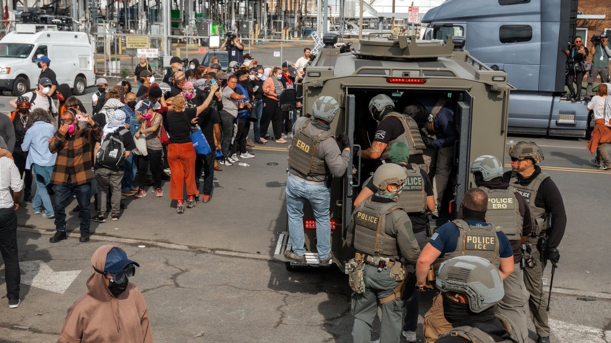 Immigration and Customs Enforcement (ICE) officers load into an armored vehicle during a protest against the treatment of detainees, Newark, U.S., May 25, 2026. (EPA Photo)