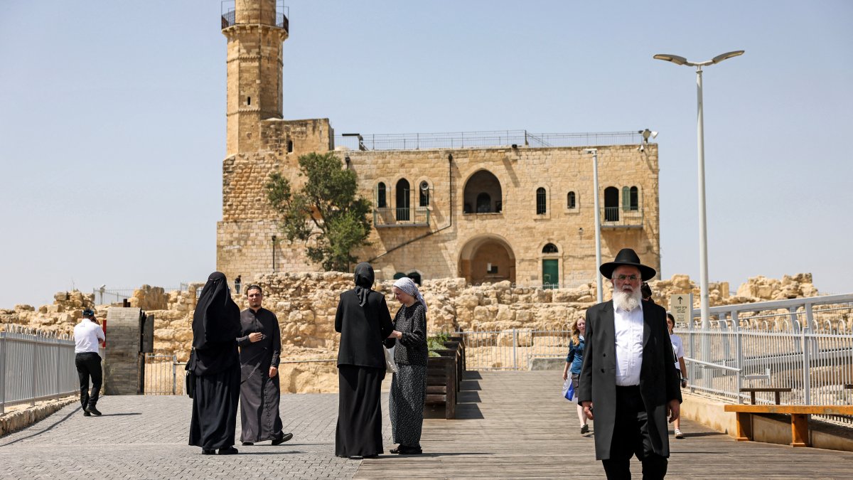 An ultra-Orthodox Jewish man leaves the Tomb of Samuel at the Nabi Samuel village between Ramallah and Jerusalem in the occupied West Bank, Sept. 2, 2022. (AFP File Photo)