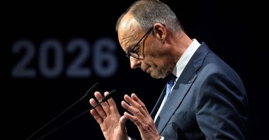 German Chancellor Friedrich Merz gestures as he addresses guests to open a so-called eSummit organized by the ZVEI Association of the German electro and digital industry, Berlin, Germany, May 20, 2026. (AFP Photo)