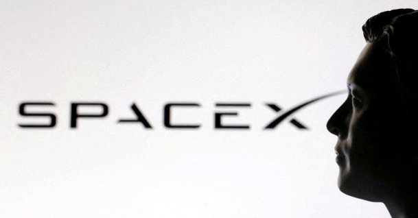 A 3D-printed miniature model of Elon Musk and a SpaceX logo are seen in this illustration created, Jan. 23, 2025. (Reuters Photo)