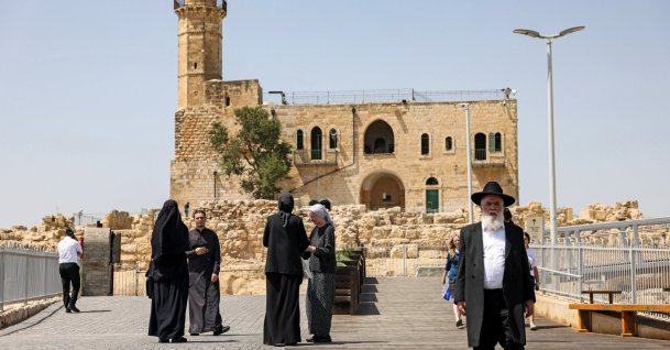 An ultra-Orthodox Jewish man leaves the Tomb of Samuel at the Nabi Samuel village between Ramallah and Jerusalem in the occupied West Bank, Sept. 2, 2022. (AFP File Photo)