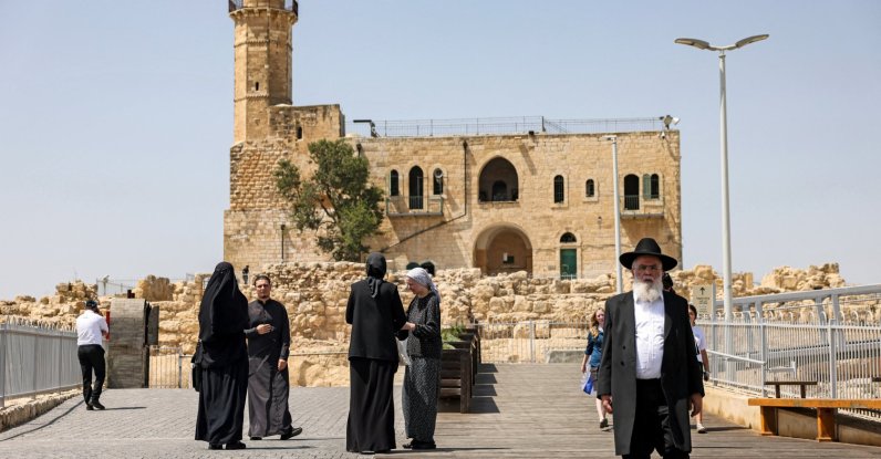 An ultra-Orthodox Jewish man leaves the Tomb of Samuel at the Nabi Samuel village between Ramallah and Jerusalem in the occupied West Bank, Sept. 2, 2022. (AFP File Photo)