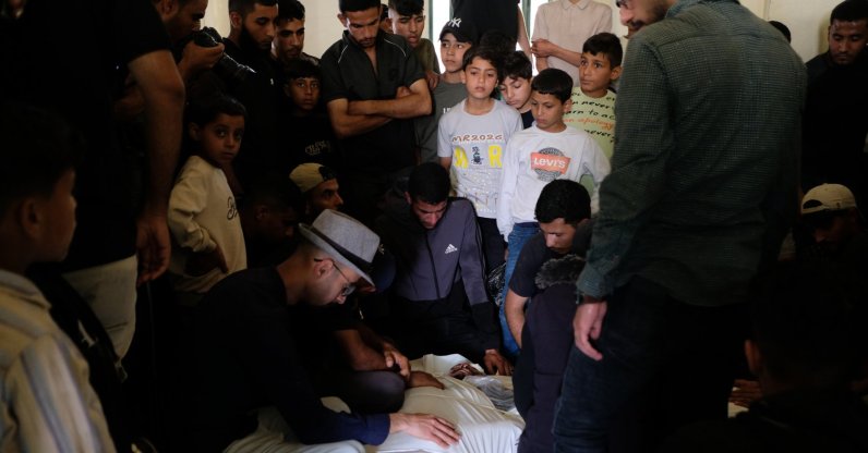 Palestinians mourn over the body of Mohammad Odeh, whom Israel says was a leader of Hamas Qassam Brigades, a day after he was killed in an Israeli airstrike, during his funeral, Gaza City, Palestine, May 27, 2026. (AP Photo)