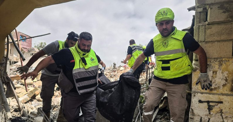 Civil defence members remove a body from the rubble of a residential building hit the previous day by an Israeli strike near the southern town of Burj al-Shamali, Tyre, Lebanon, May 27, 2026. (AFP Photo)