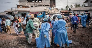 Health workers in protective gowns and masks operate at a checkpoint set up to prevent Ebola in Kanyaruchinya, near Goma, North Kivu, DRC, May 27, 2026. (EPA Photo)