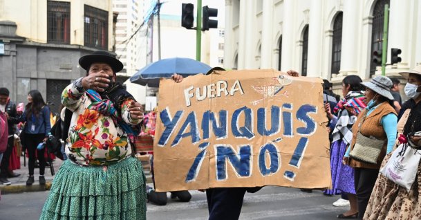 An Aymara woman shouts next to a sign reading "Yankees Out! No!" during a protest led by women on Bolivia's Mother's Day, calling for the resignation of Bolivian President Rodrigo Paz, as the country's economic and fuel crisis worsens due to a shortage of U.S. dollars and declining domestic energy production, in La Paz, Bolivia, May 27, 2026. (Reuters Photo)