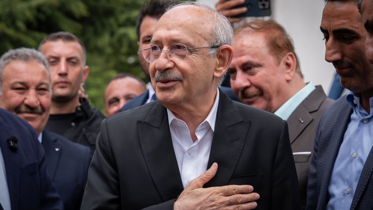 Kemal Kılıçdaroğlu, chairperson of the Republican People’s Party (CHP), greets visitors outside his residence during Eid holiday celebrations in Ankara, Türkiye, May 28, 2026. (AA Photo)