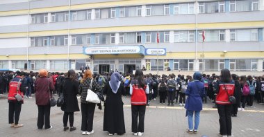 Students and teachers hold a memorial ceremony for the teacher and students killed in a school shooting, Kahramanmaraş, Türkiye, April 20, 2026. (AA Photo)
