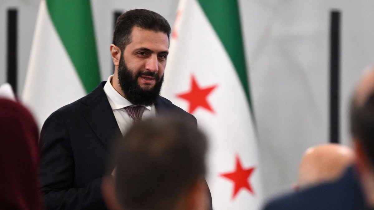 Syrian President Ahmed al-Sharaa arrives to attend the second day of the first Syrian-Emirati (United Arab Emirates) Investment Forum, at the People's Palace in Damascus, Syria, May 12, 2026. (AFP Photo)