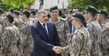Interior Minister Mustafa Çiftçi shakes hands with Special Operations police officers, Ankara, Türkiye, May 31, 2026. (AA Photo)