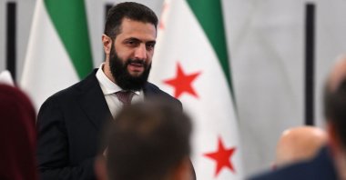 Syrian President Ahmed al-Sharaa arrives to attend the second day of the first Syrian-Emirati (United Arab Emirates) Investment Forum, at the People's Palace in Damascus, Syria, May 12, 2026. (AFP Photo)