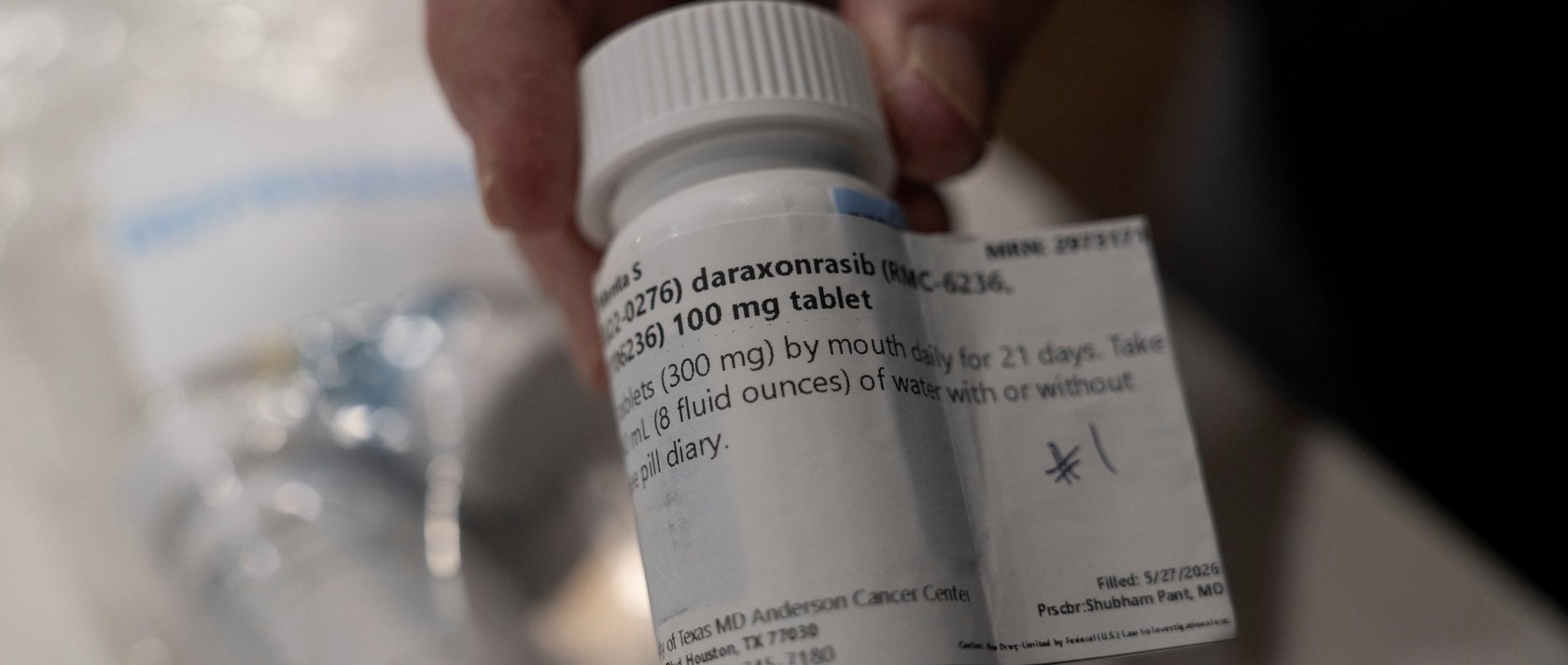 Menta "Steve" Wallace shows a bottle of daraxonrasib, Revolution Medicine's pancreatic cancer drug, at his home in The Woodlands, Texas, U.S., May 29, 2026. (Reuters Photo)