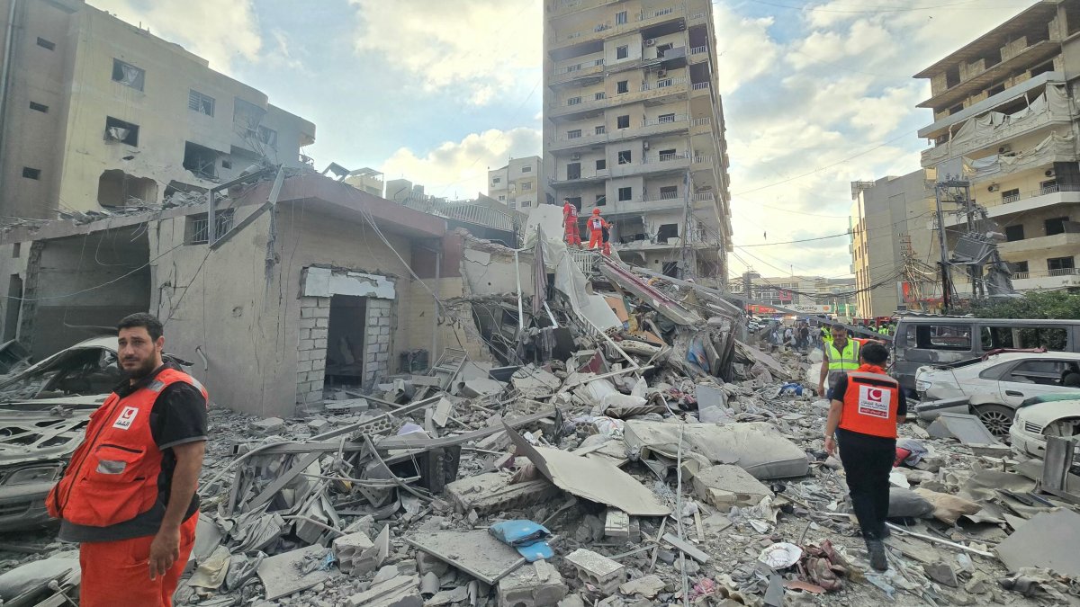 First responders inspect the damage at the site of an Israeli strike that hit near a hospital in the southern city of Tyre, Lebanon, June 1, 2026. (AFP Photo)