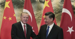 President Recep Tayyip Erdoğan and Chinese President Xi Jinping shake hands prior to their meeting at the Great Hall of the People, Beijing, China, July 2, 2019. (AP Photo)