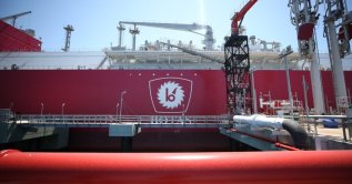 The logo of BOTAŞ is seen on Türkiye's first FSRU Ertuğrul Gazi at a port in Hatay, southeastern Türkiye, April 22, 2021. (AA Photo)