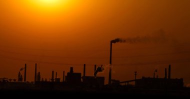 Factories are silhouetted during sunset, Handan, Hebei province, China, April 7, 2026. (Reuters Photo)