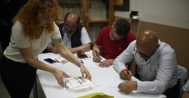Election representatives count ballots at a polling station in Istanbul, Türkiye, May 28, 2023. (AP Photo)