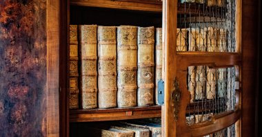 Ancient books in an old library. (Shutterstock Photo)
