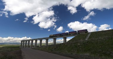 A train runs along a section of the newly opened Baku-Tbilisi-Kars (BTK) railway line, near Akhalkalaki, Georgia June 2, 2026. (Reuters Photo)