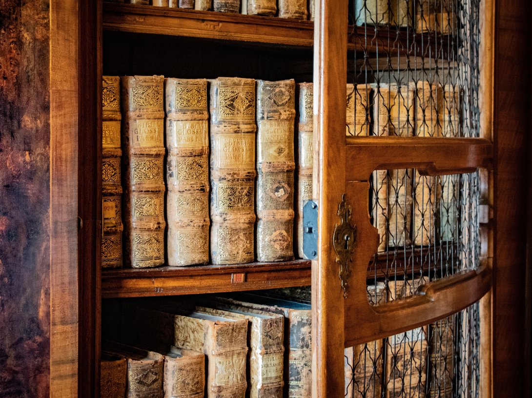 Ancient books in an old library. (Shutterstock Photo)