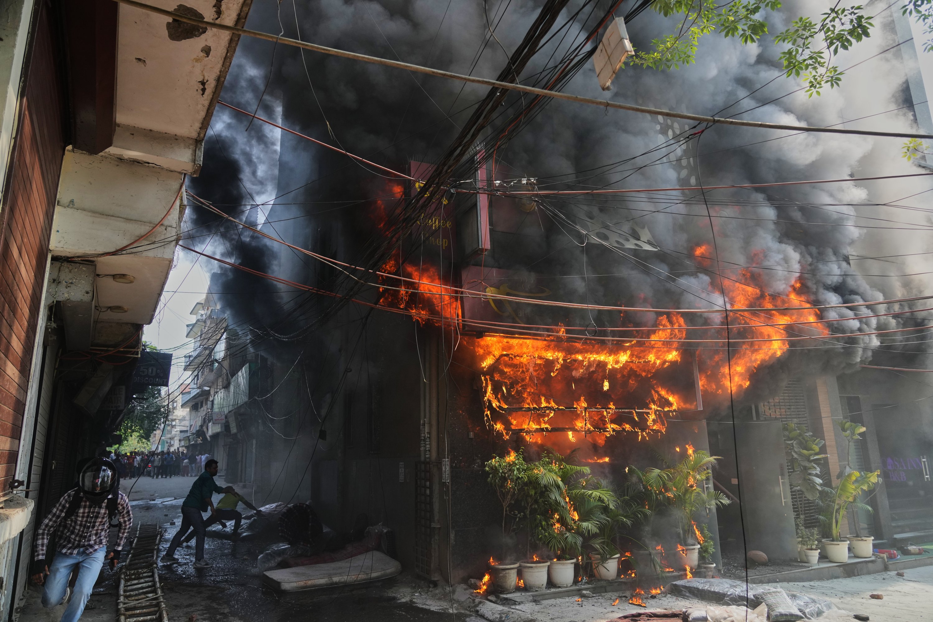 At least 18 foreigners among 21 killed in New Delhi hotel fire