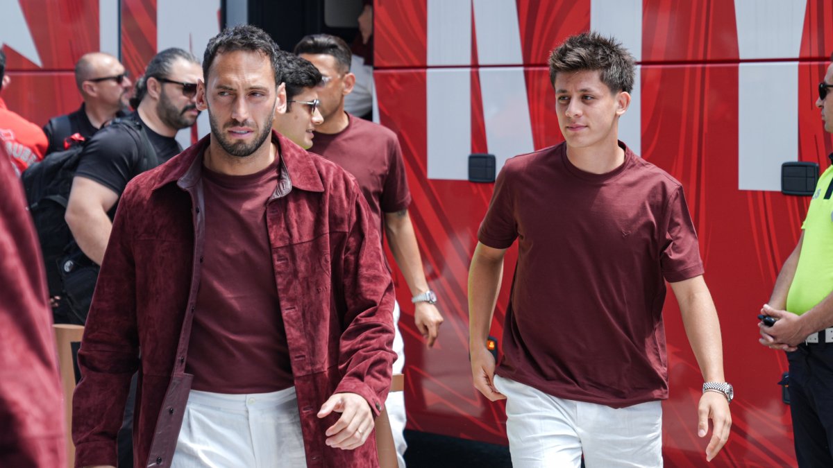 Türkiye national team players Hakan Çalhanoğlu (L) and Arda Güler arrive at Istanbul Airport before departing for the United States aboard a charter flight for the 2026 FIFA World Cup, Istanbul, Türkiye, June 2, 2026. (AA Photo)
