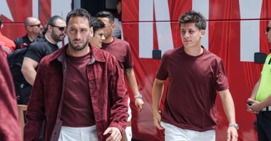 Türkiye national team players Hakan Çalhanoğlu (L) and Arda Güler arrive at Istanbul Airport before departing for the United States aboard a charter flight for the 2026 FIFA World Cup, Istanbul, Türkiye, June 2, 2026. (AA Photo)
