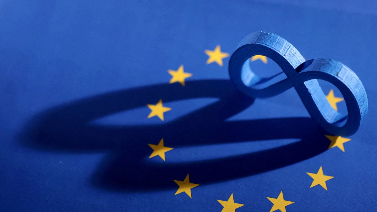 The EU flag and Meta logo are seen in this illustration created on May 22, 2023. (Reuters Photo)