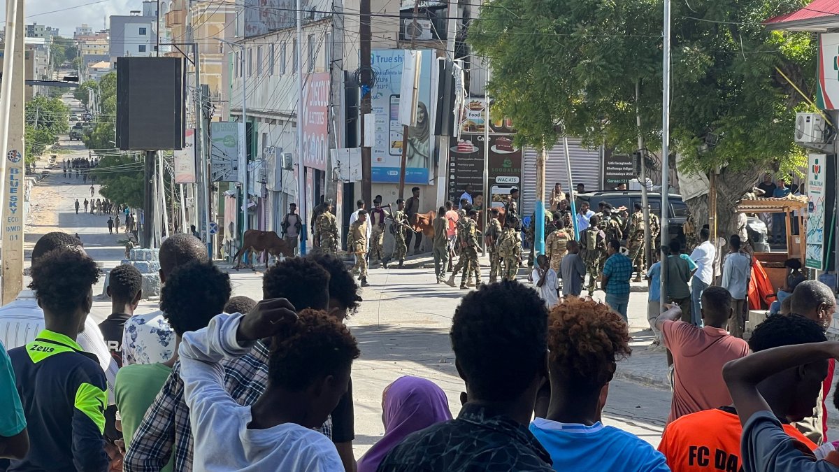 Members of Somali government forces stand among civilians at a street junction ahead of a planned protest, in Mogadishu, Somalia, June 4, 2026. (Reuters Photo)