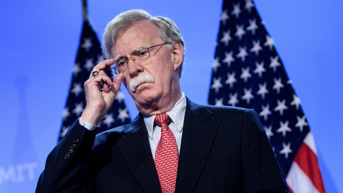 U.S. National Security Advisor John Bolton looks on as U.S. President Donald Trump addresses a press conference on the second day of the North Atlantic Treaty Organization (NATO) summit in Brussels, July 12, 2018. (AFP File Photo)