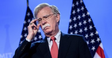 U.S. National Security Advisor John Bolton looks on as U.S. President Donald Trump addresses a press conference on the second day of the North Atlantic Treaty Organization (NATO) summit in Brussels, July 12, 2018. (AFP File Photo)