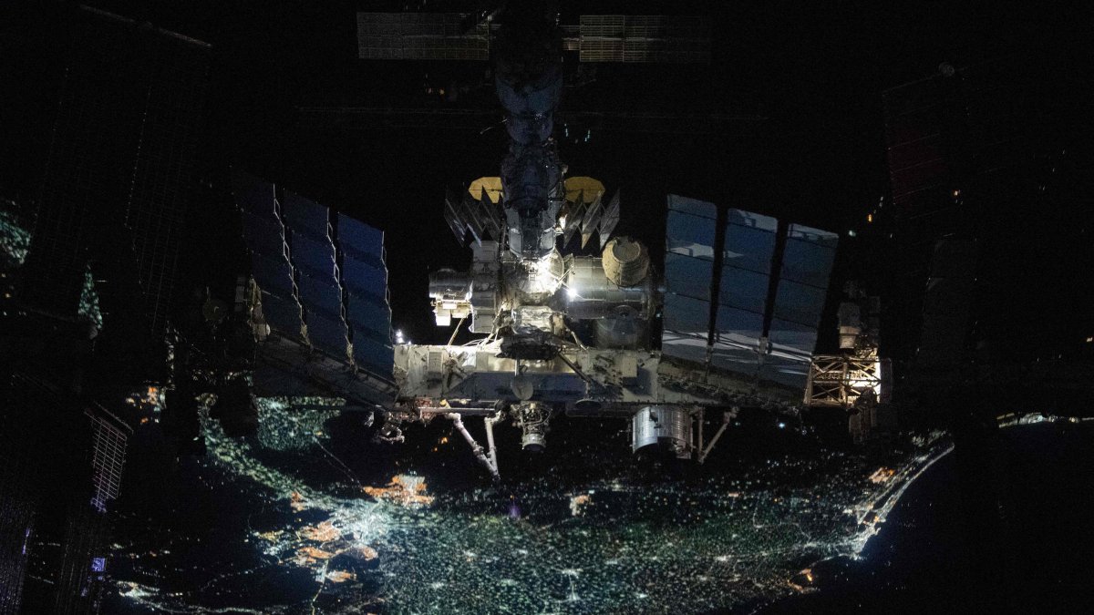  International Space Station pictured from the SpaceX Crew Dragon Endeavour during a fly around of the orbiting lab that took place following its undocking from the Harmony module’s space-facing port, Nov. 8, 2021. (NASA Handout via AFP)