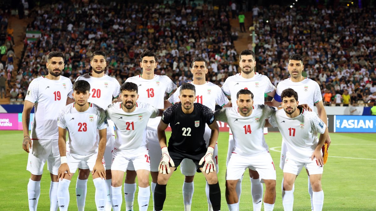 The starting eleven of Iran pose for a team picture during the FIFA World Cup 2026 qualification match between Iran and North Korea in Tehran, Iran, June 10, 2025. (EPA File Photo)