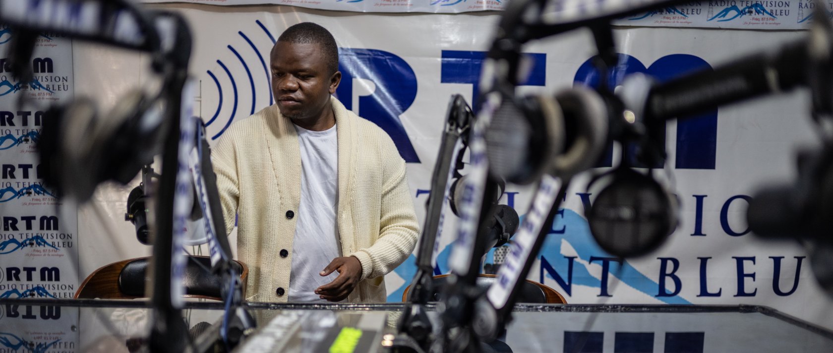 Verite Johnson works at a community radio station, providing daily awareness and updates on Ebola, Bunia, Congo, June 4, 2026. (AP Photo)