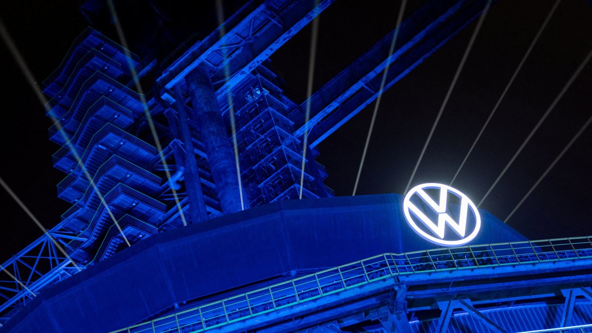 A logo of Volkswagen appears on the illuminated preserved blast furnace during the company’s event at Shougang Park, Beijing, China, April 8, 2026. (Reuters Photo)