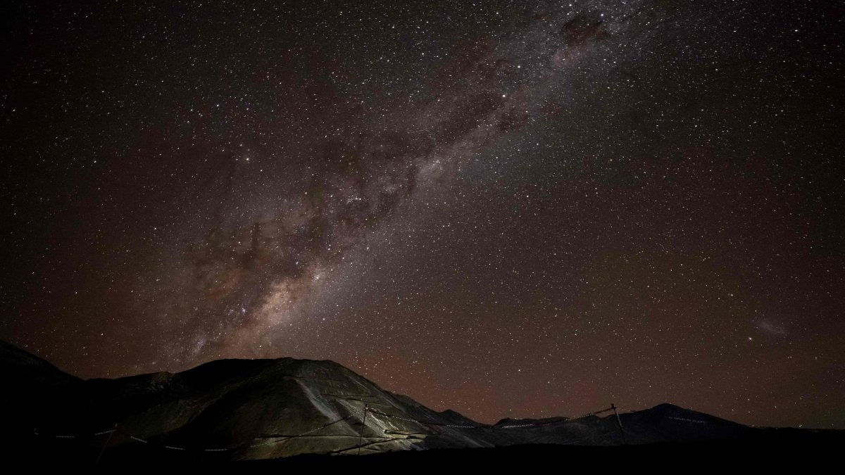 A night photo shows the Milky Way over the Los Azules Copper Mining Project in the Andes mountain range in Calingasta, San Juan province, Argentina, April 21, 2026. (AFP Photo)