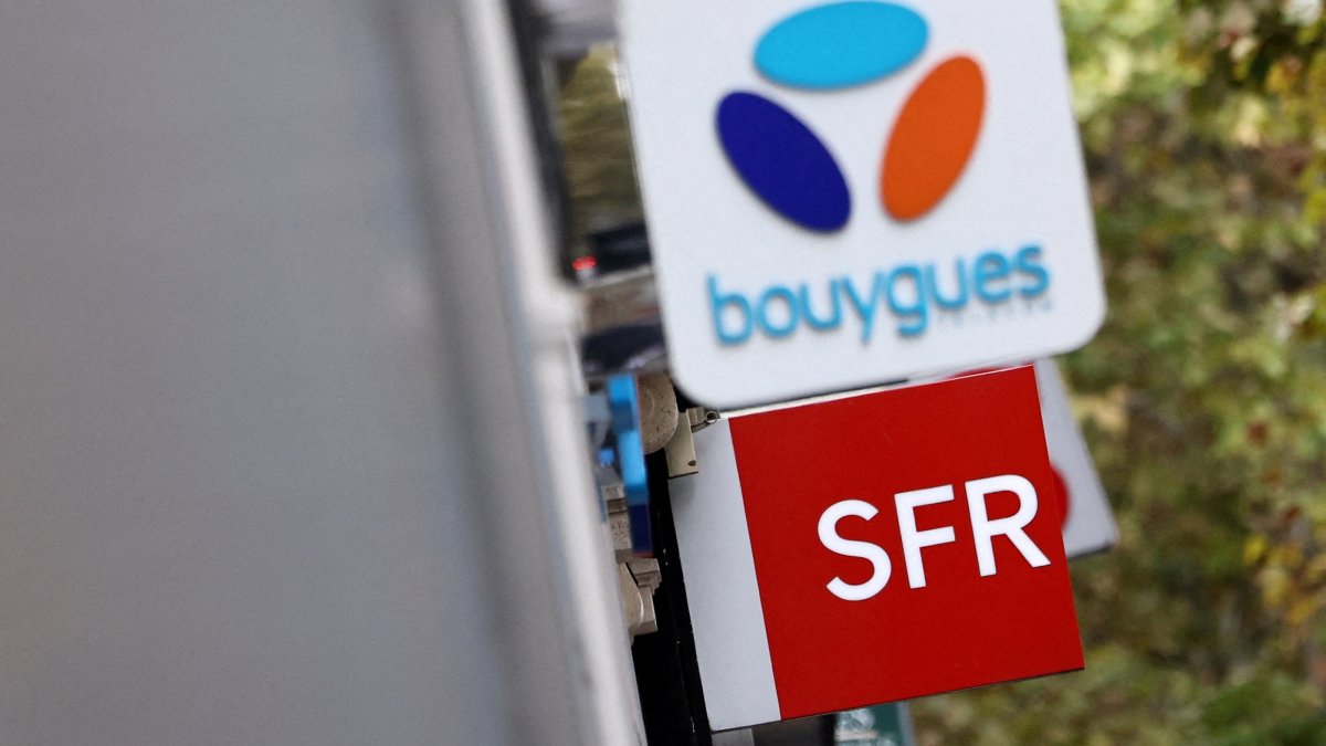 The logos of French telecom operators Bouygues and SFR are seen on shops in Paris, France, Oct. 15, 2025. (Reuters Photo)