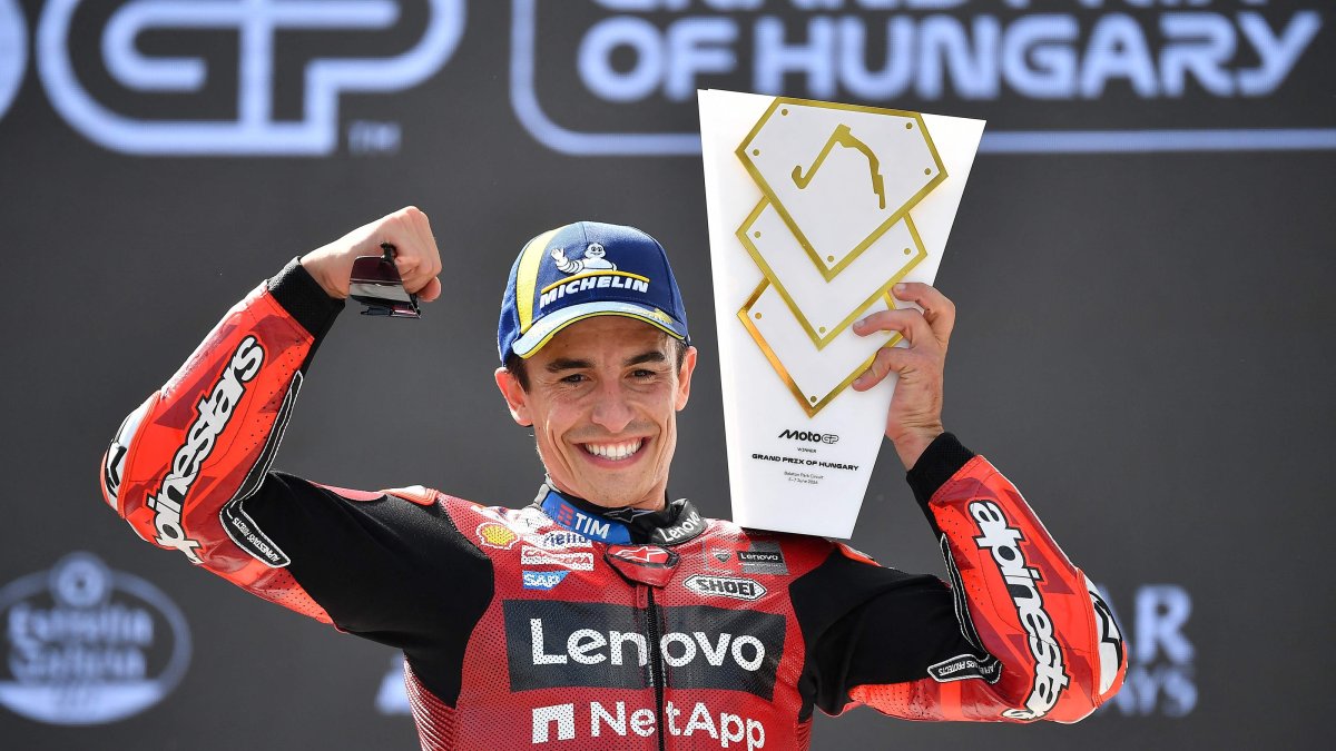 Ducati Lenovo's Marc Marquez celebrates with the trophy after the Hungarian Motorcycle MotoGP, in Balatonfokajar, Hungary, June 7, 2026. (AFP Photo)