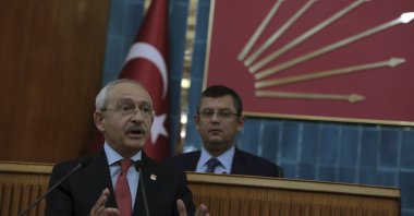 CHP Chairperson Kemal Kılıçdaroğlu addresses the party's lawmakers as lawmaker Özgür Özel looks on at a parliamentary group meeting, Ankara, Türkiye, Jan. 21, 2017. (AP Photo)